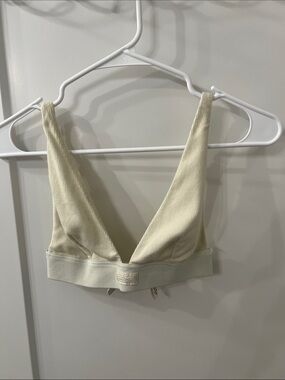 SKIMS. Pale yellow plunge bralette